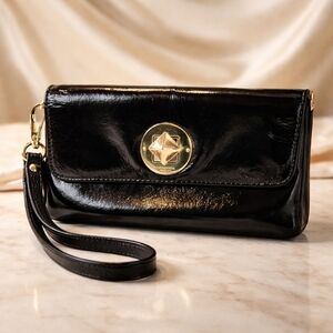 Kate Spade Storybook Black Wristlet with Gold Star Accent
